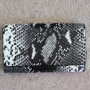 Elegant Black and White Snakeskin Clutch